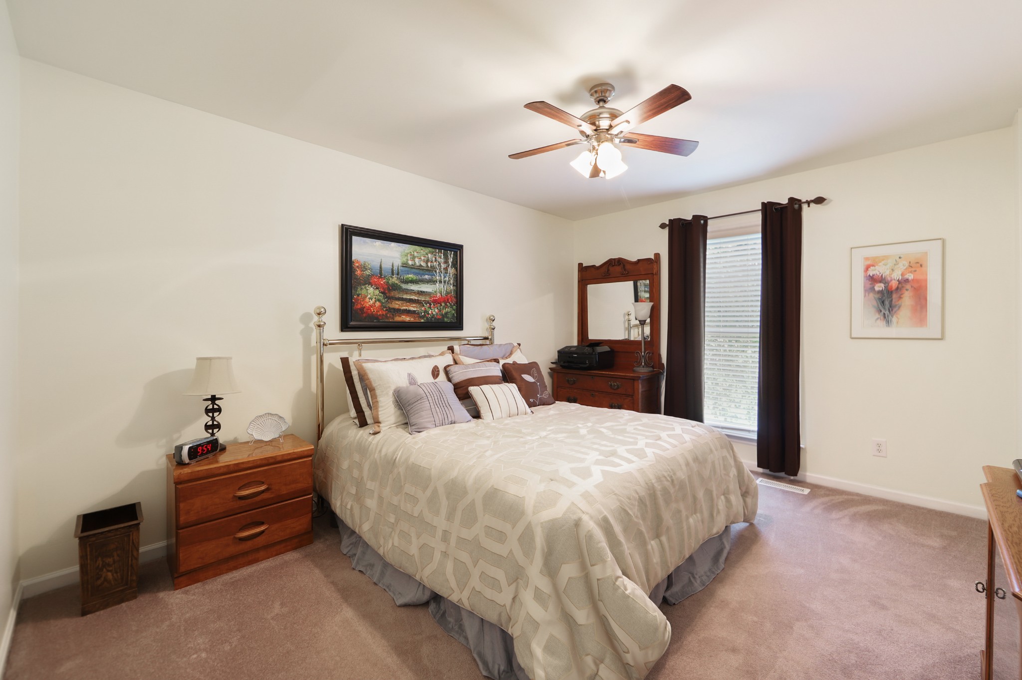 832 Rands Way Columbia, TN 38401 - Photo 28 of 49 a bed room with a bed and a chandelier