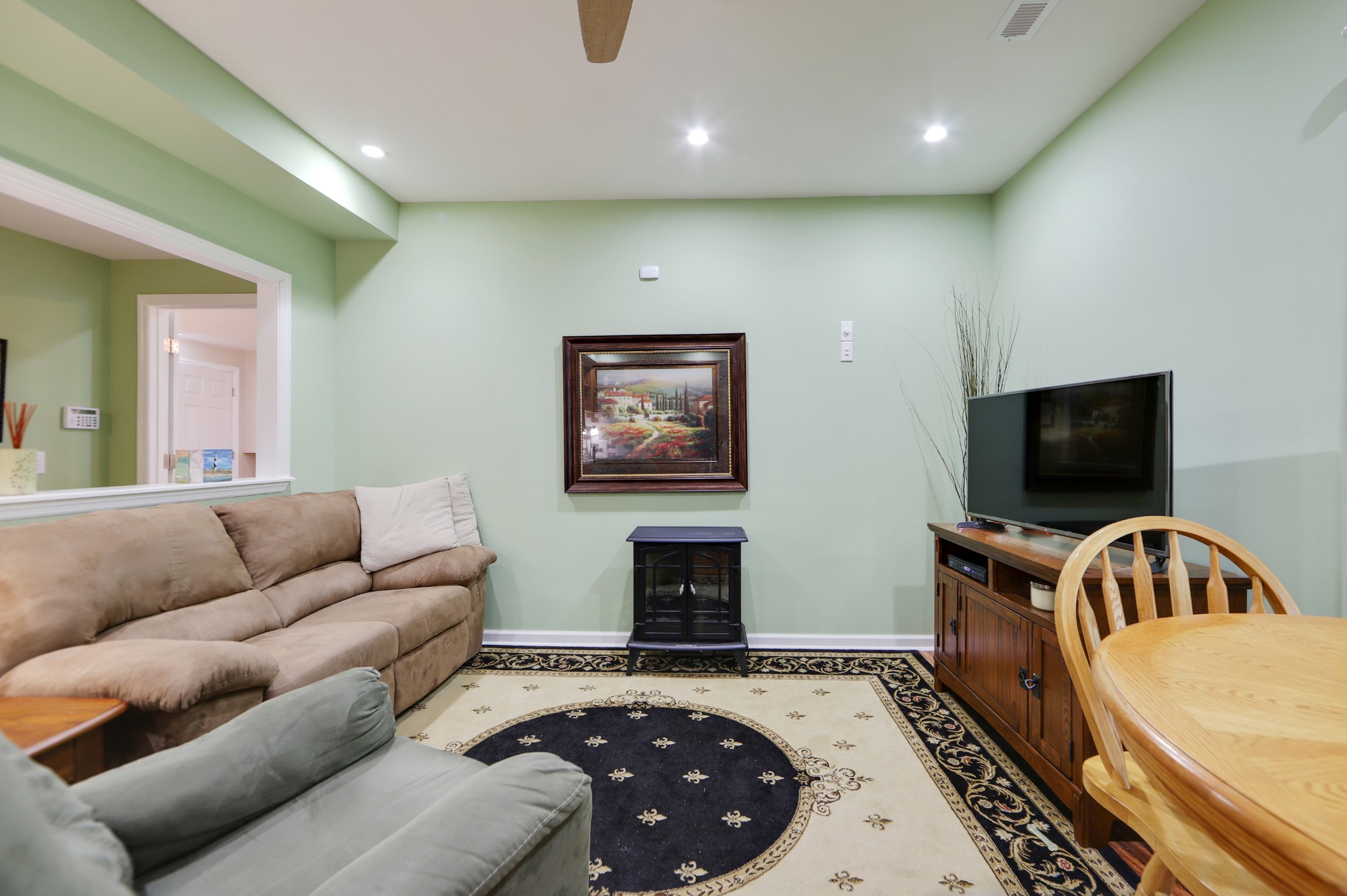 832 Rands Way Columbia, TN 38401 - Photo 30 of 49 a living room with furniture and a flat screen tv