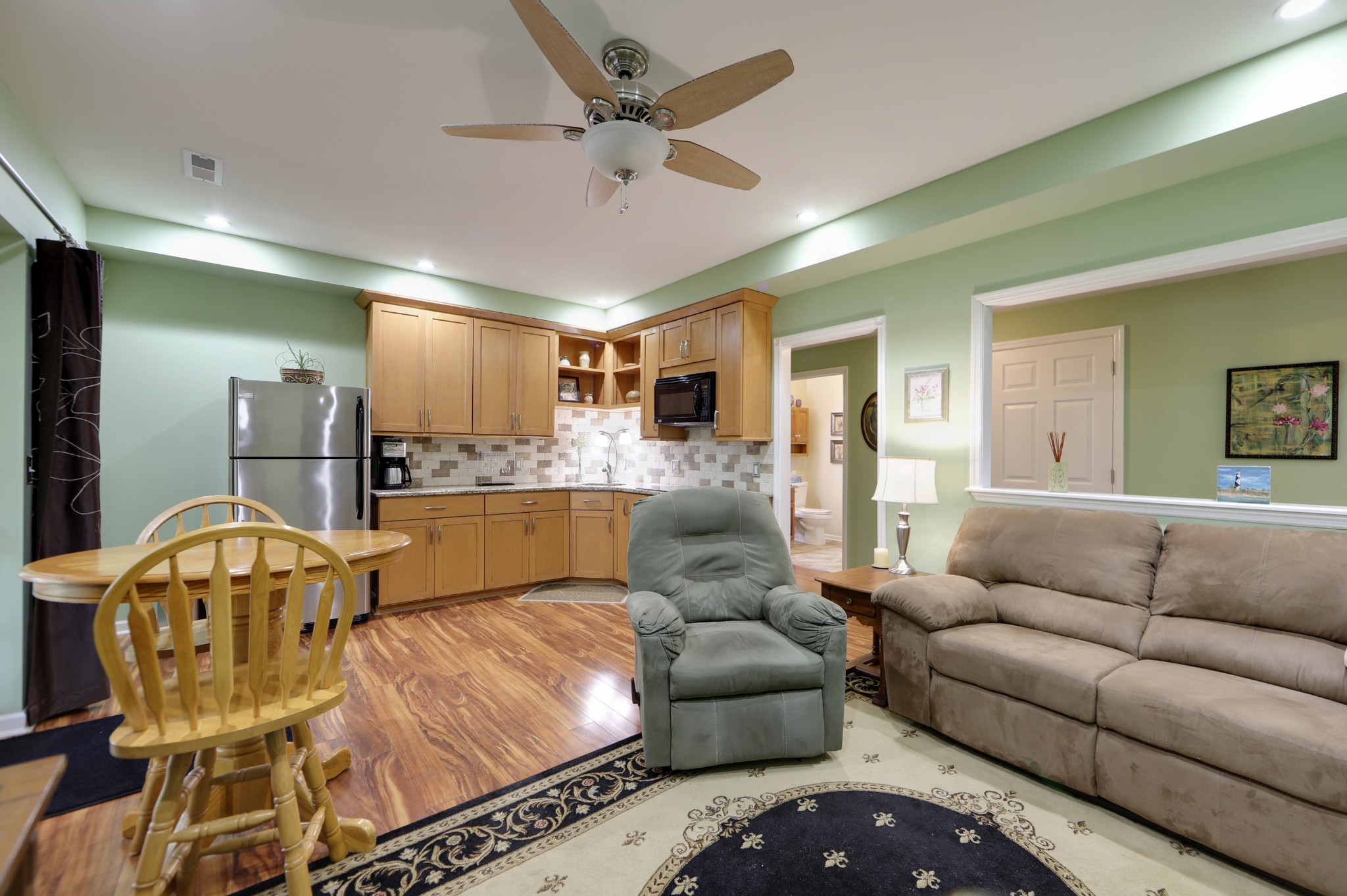 832 Rands Way Columbia, TN 38401 - Photo 31 of 49 a living room with furniture kitchen view and a chandelier