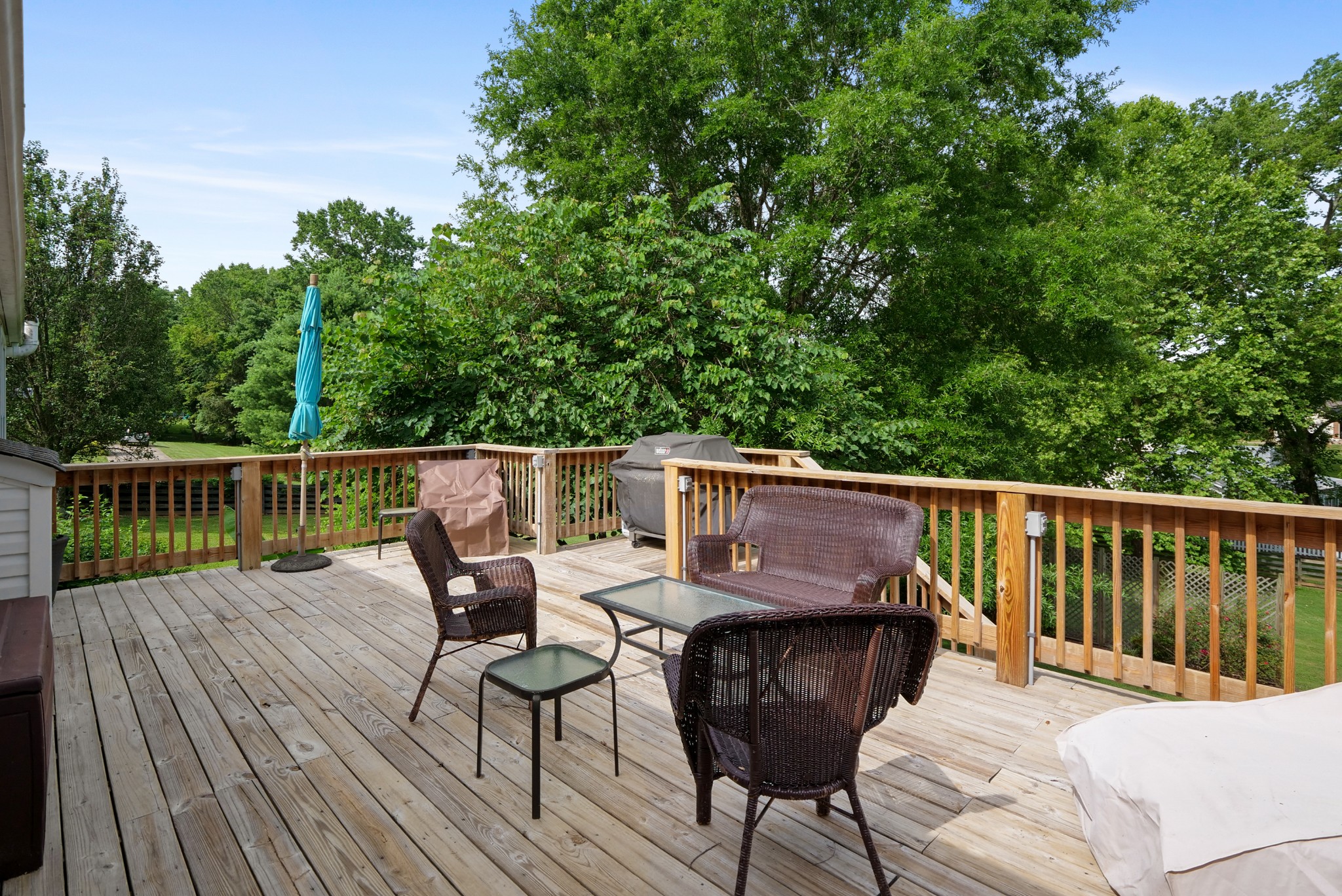 832 Rands Way Columbia, TN 38401 - Photo 44 of 49 a view of a chair and table on the wooden deck