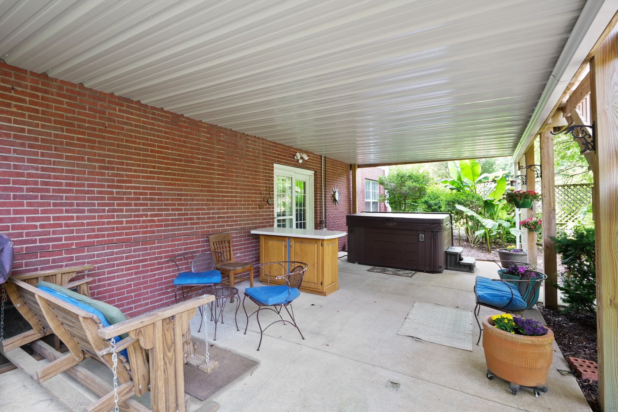 832 Rands Way Columbia, TN 38401 - Photo 46 of 49 a patio with table and chairs and potted plants