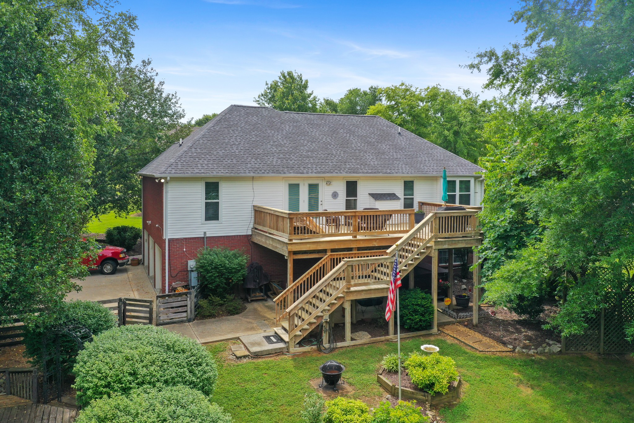 832 Rands Way Columbia, TN 38401 - Photo 48 of 49 a yellow and red house with a white fence