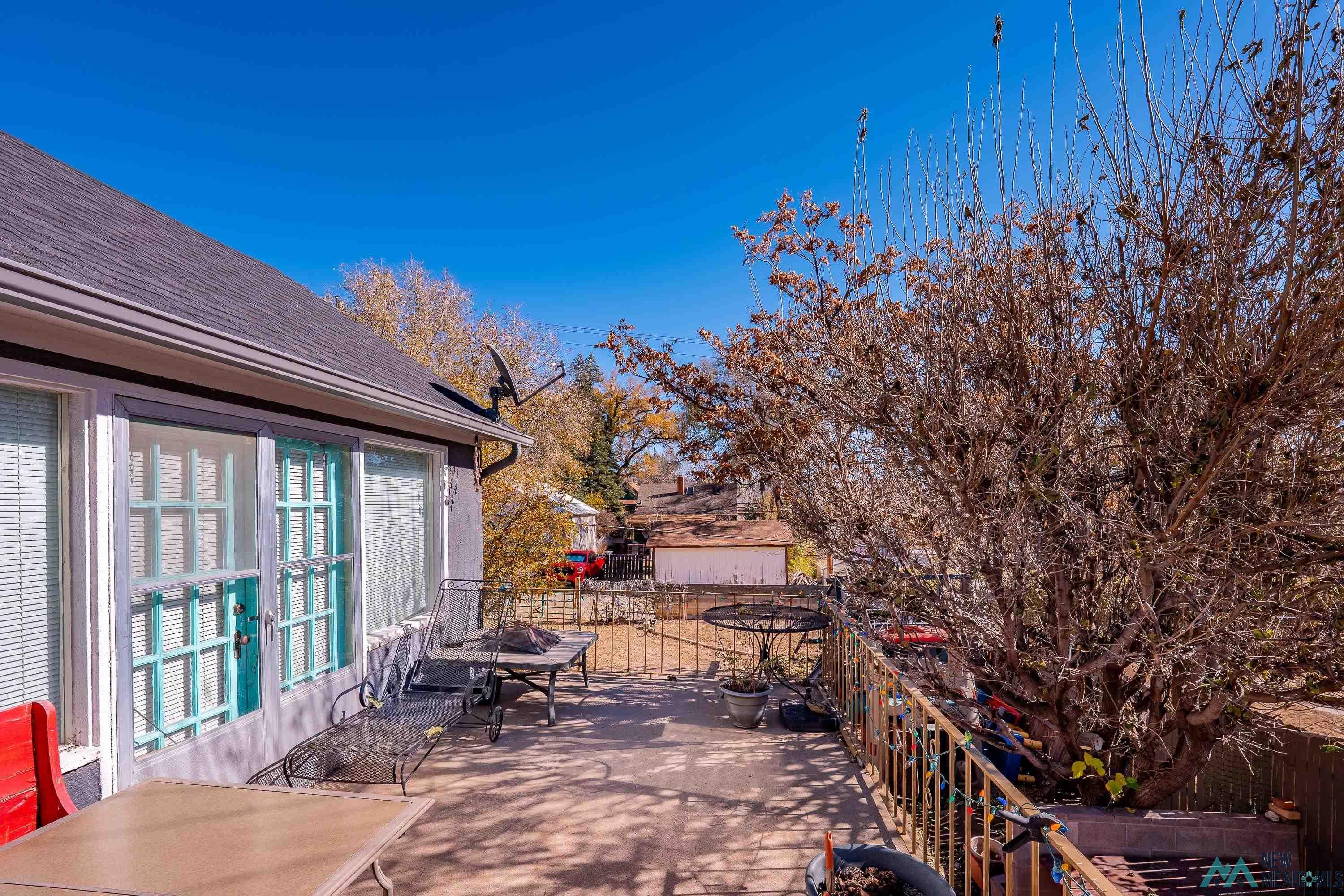 727 South 6th Street Raton, NM 87740 - Photo 40 of 47 Wooden terrace featuring outdoor dining space