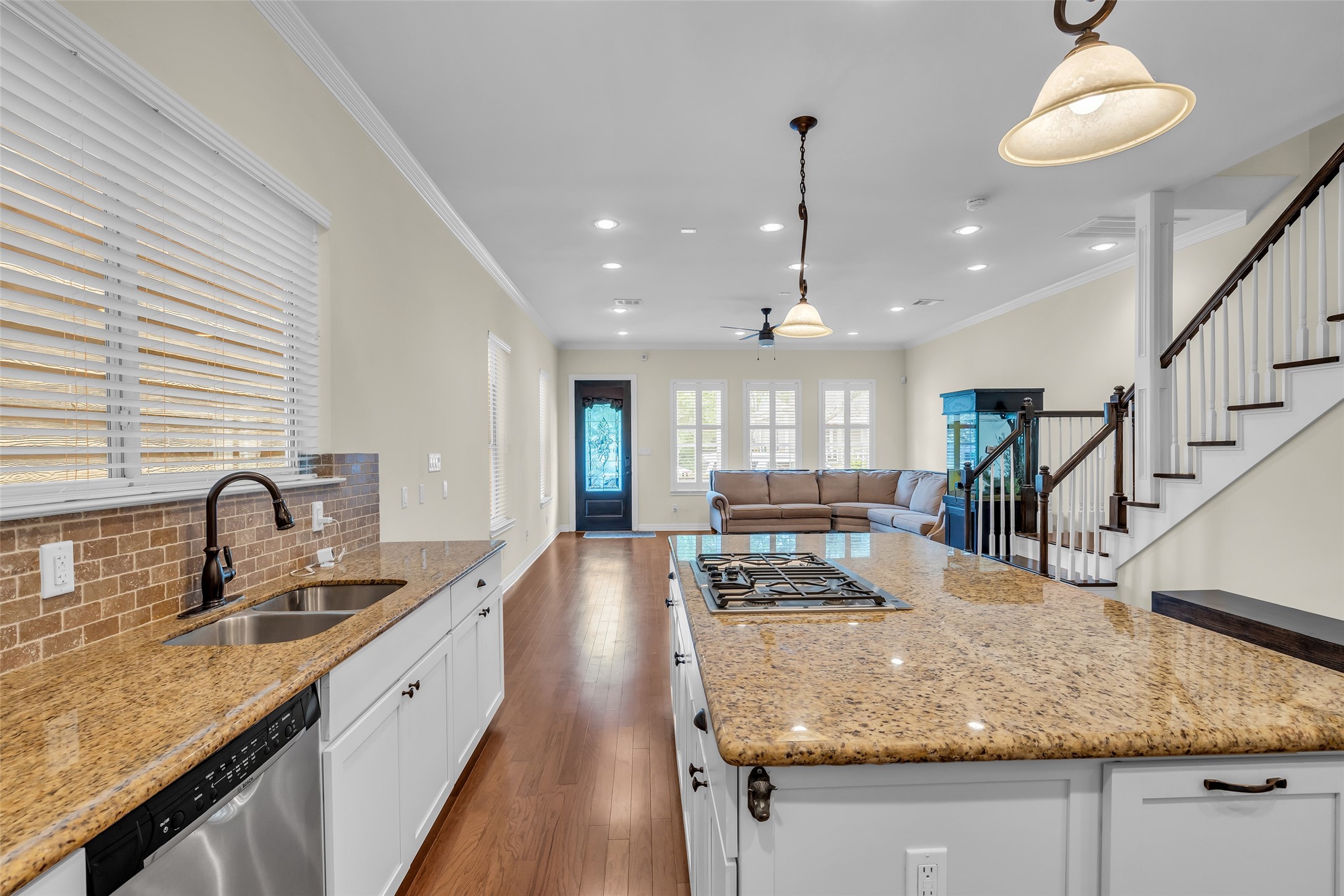 1423 Colorado Street Houston, TX 77007 - Photo 10 of 28 All countertops are finished in granite, providing a durable and easy-to-maintain surface throughout the kitchen.