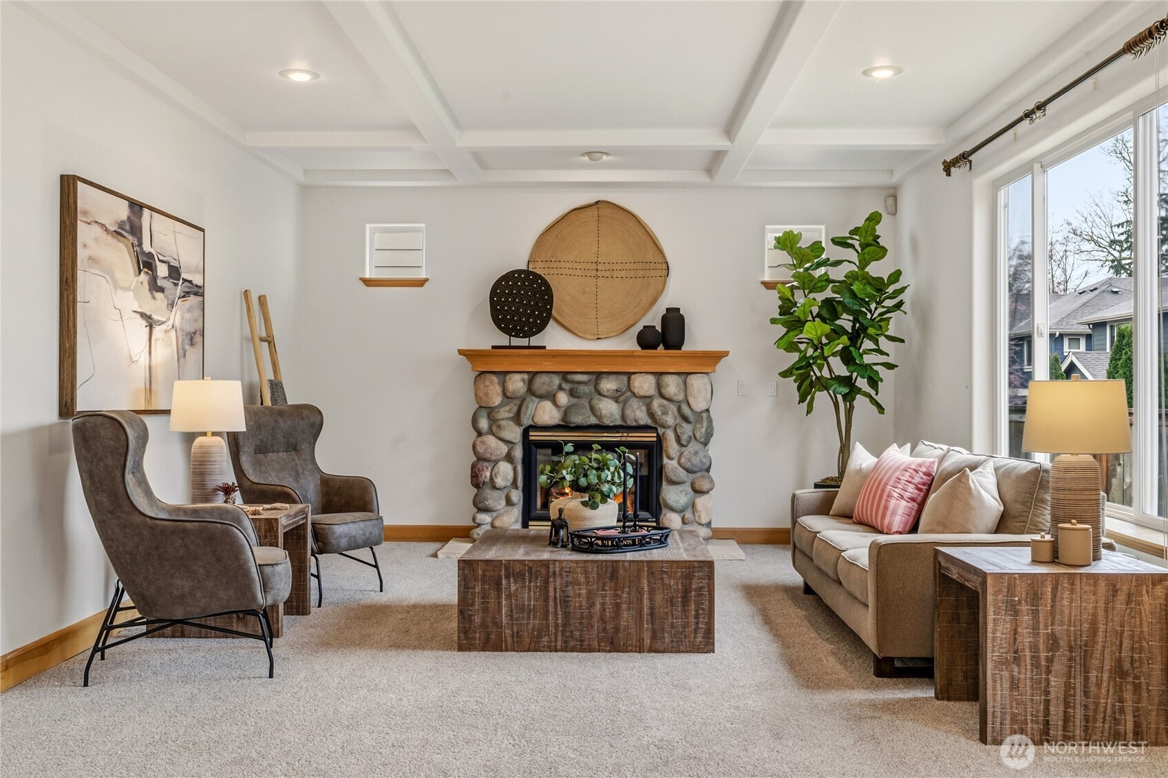 18639 175th Avenue Southeast Renton, WA 98058 - Photo 16 of 37 a living room with furniture and a fireplace