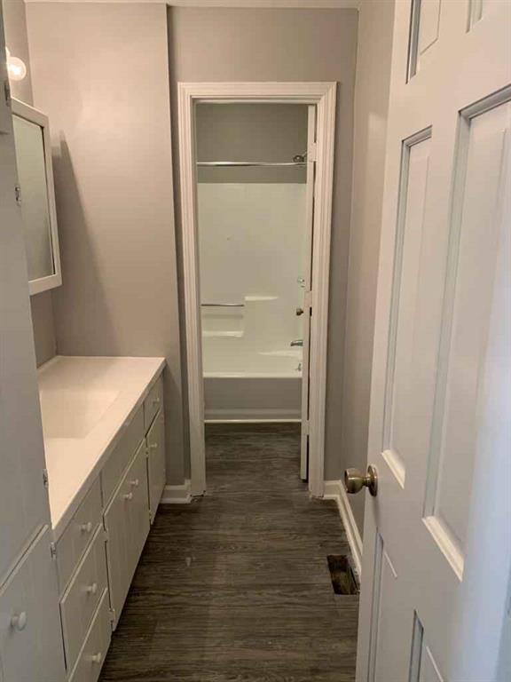 846 Idlewood Road Winder, GA 30680 - Photo 19 of 27 a bathroom with a sink and mirror