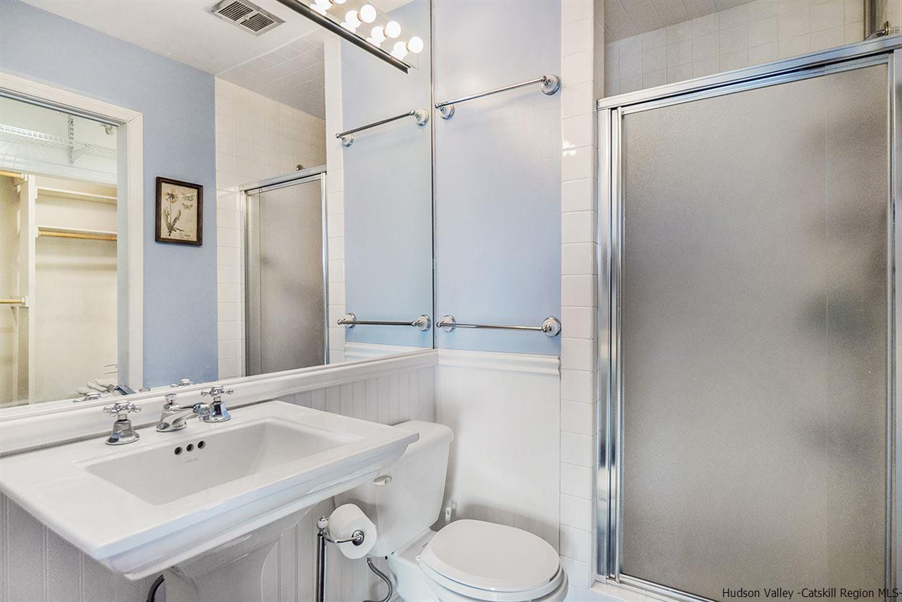 5999 Route 23c Route Prattsville, NY 12468 - Photo 20 of 31 a bathroom with a sink toilet and shower