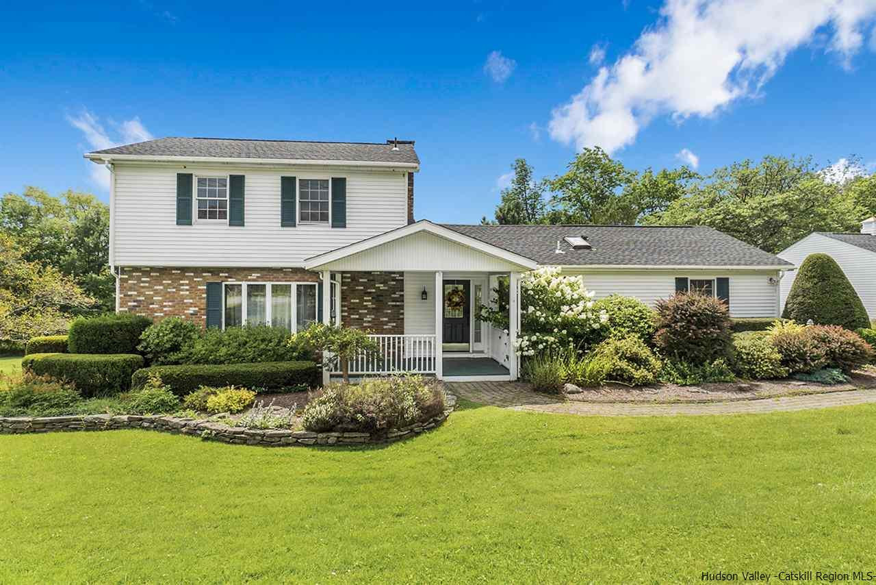 5999 Route 23c Route Prattsville, NY 12468 - Photo 25 of 31 a front view of a house with garden and porch