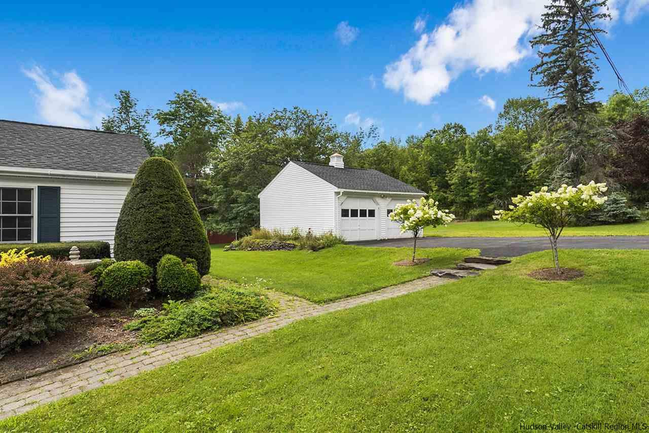 5999 Route 23c Route Prattsville, NY 12468 - Photo 26 of 31 a view of a house with backyard and trees