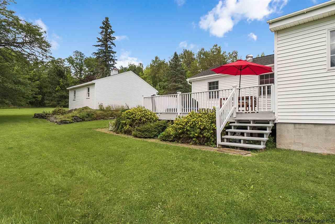 5999 Route 23c Route Prattsville, NY 12468 - Photo 29 of 31 a view of a house with a yard