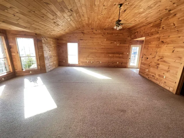a view of empty room with windows