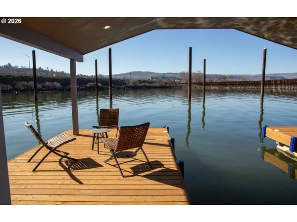 a patio with table and chairs