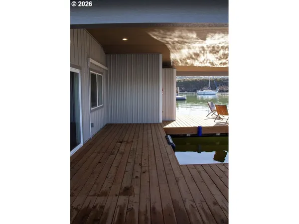 a view of a living room with a wooden floor