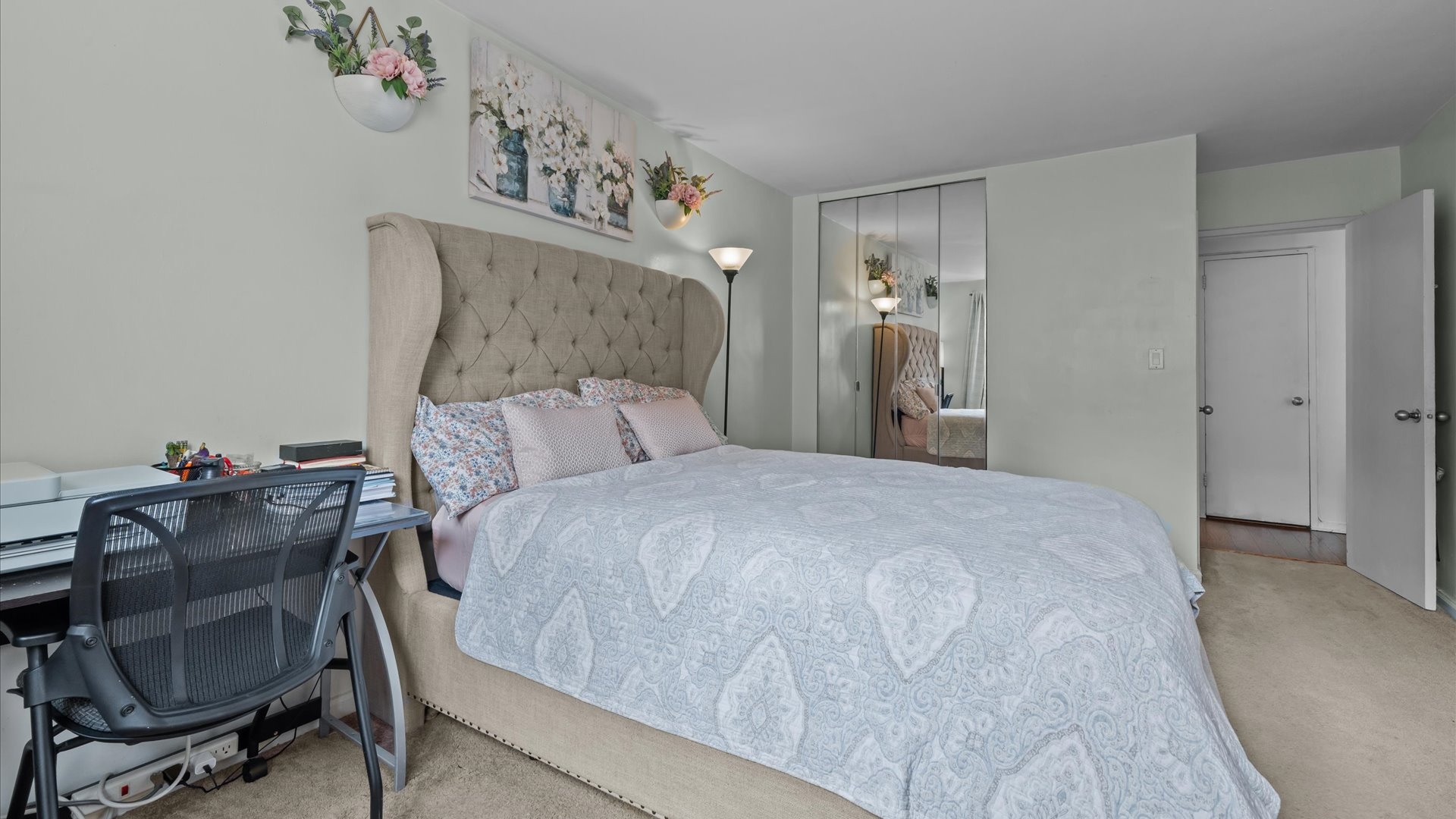 3520 Tryon Avenue, Unit 502 Bronx, NY 10467 - Photo 10 of 13 a bedroom with a bed and a table in it