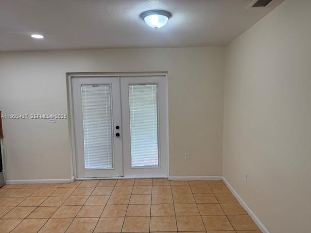1910 Southwest 99th Avenue, Unit 1 Miramar, FL 33025 - Photo 11 of 17 wooden floor in an empty room