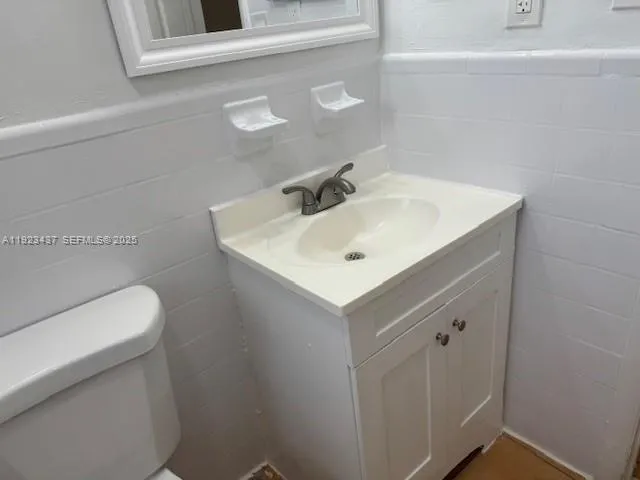 a bathroom with a sink and a toilet