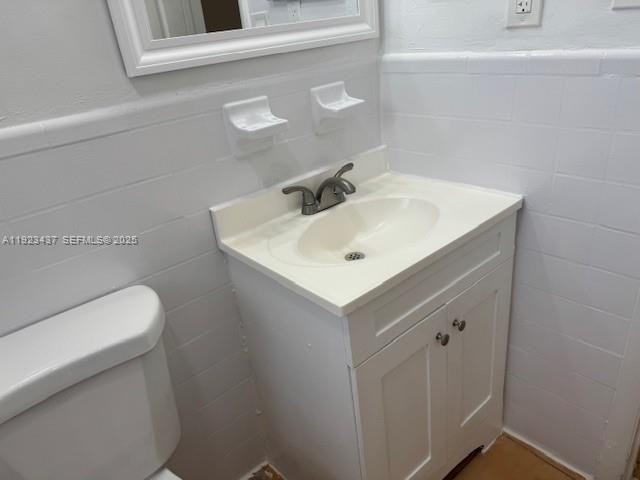 1910 Southwest 99th Avenue, Unit 1 Miramar, FL 33025 - Photo 15 of 17 a bathroom with a sink and a toilet