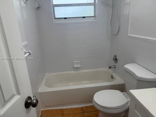 1910 Southwest 99th Avenue, Unit 1 Miramar, FL 33025 - Photo 17 of 17 a white toilet sitting next to a bath tub