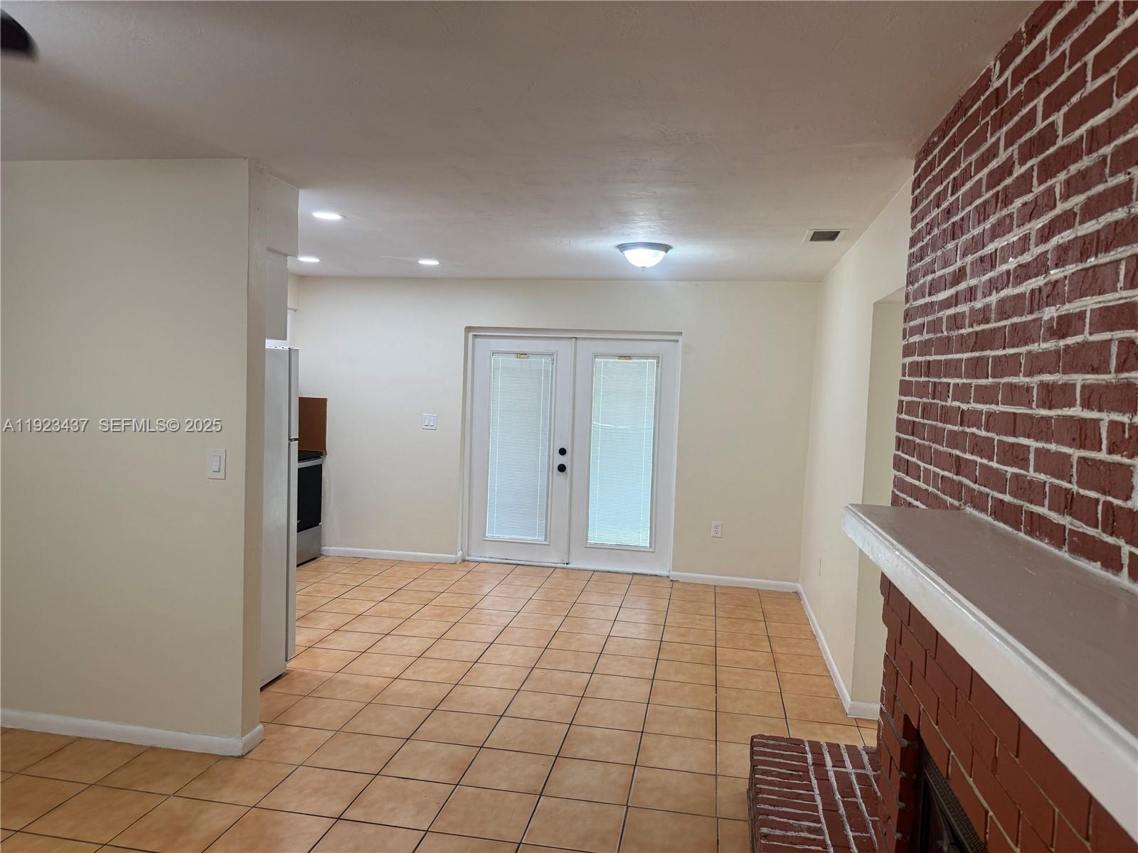 1910 Southwest 99th Avenue, Unit 1 Miramar, FL 33025 - Photo 6 of 17 a view of an empty room