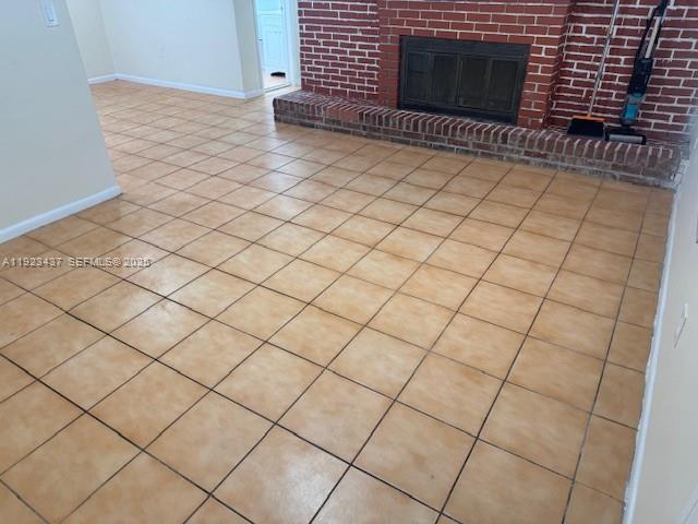 1910 Southwest 99th Avenue, Unit 1 Miramar, FL 33025 - Photo 10 of 17 a view of outdoor space with wooden fence