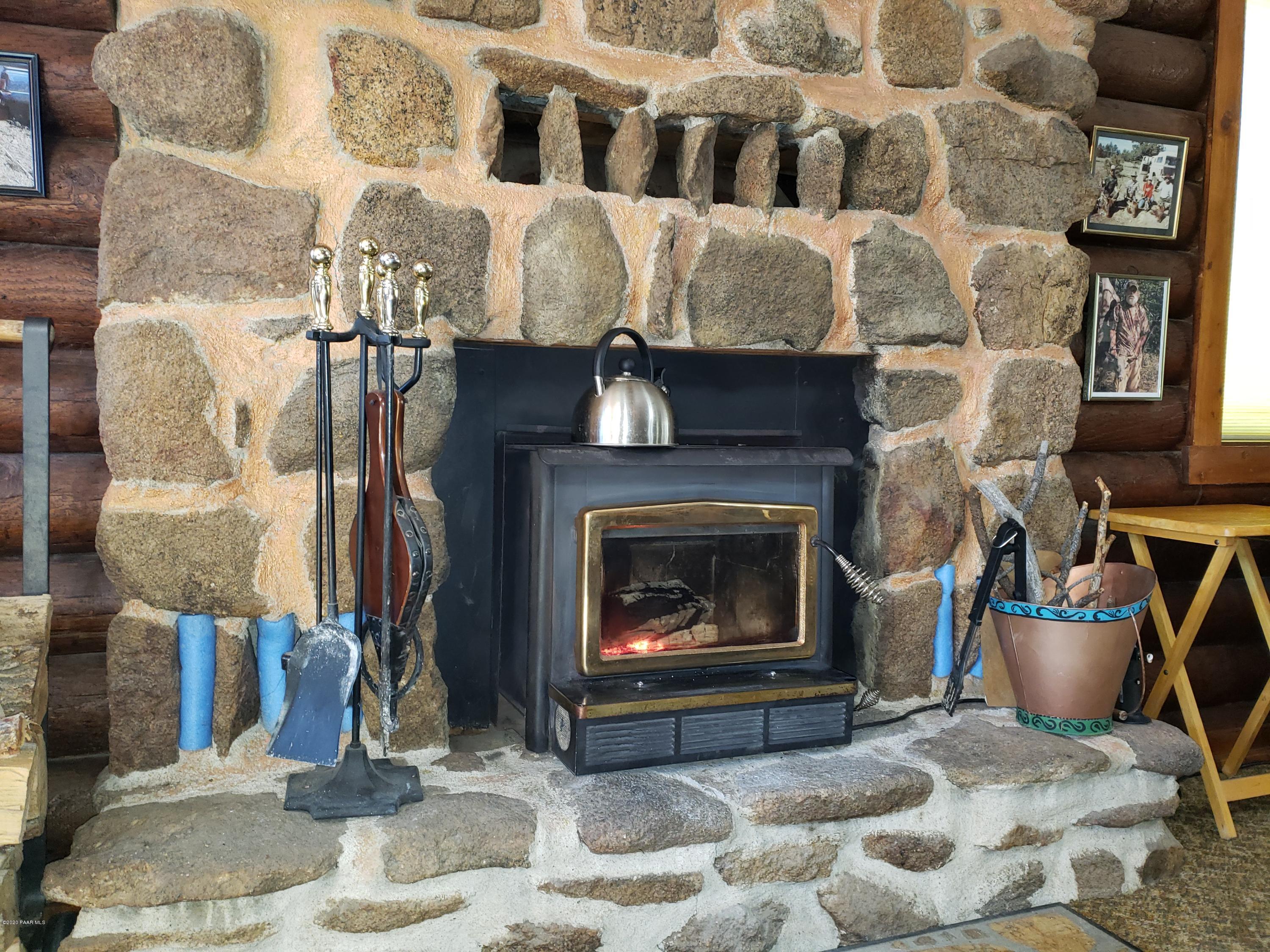 1415 Libby Loop Road Prescott, AZ 86303 - Photo 8 of 26 Wood-Burning Fireplace