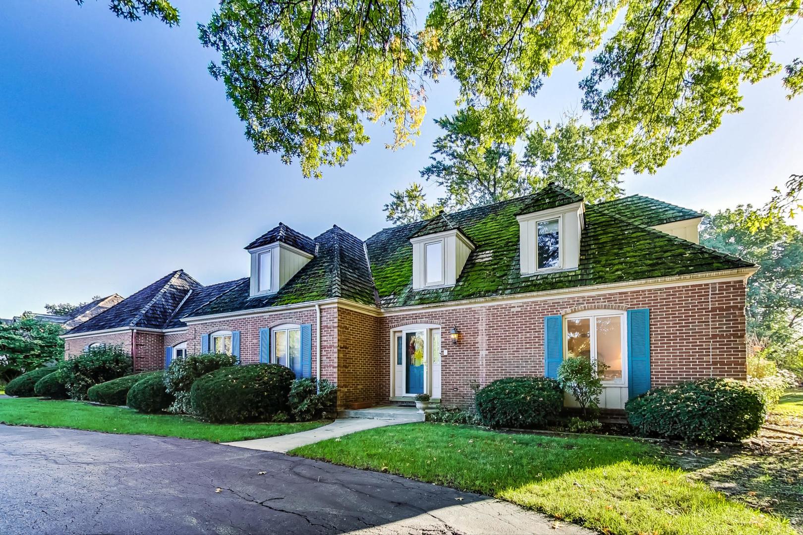 2813 Meyers Road Oak Brook, IL 60523 - Photo 2 of 62 a front view of a house with garden