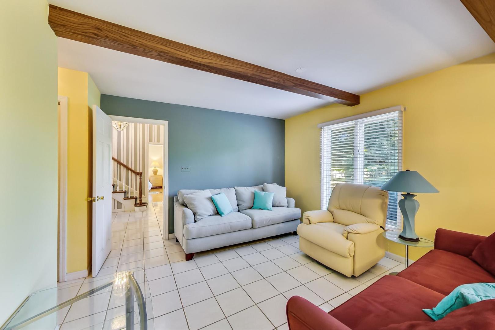 2813 Meyers Road Oak Brook, IL 60523 - Photo 16 of 62 a living room with furniture and a window