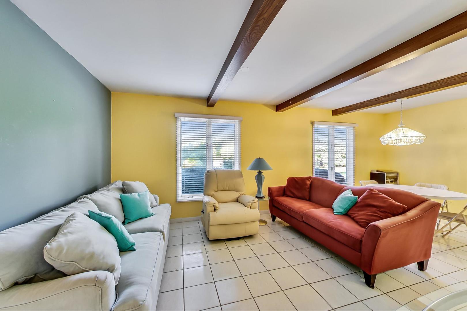 2813 Meyers Road Oak Brook, IL 60523 - Photo 17 of 62 a living room with furniture and a large window