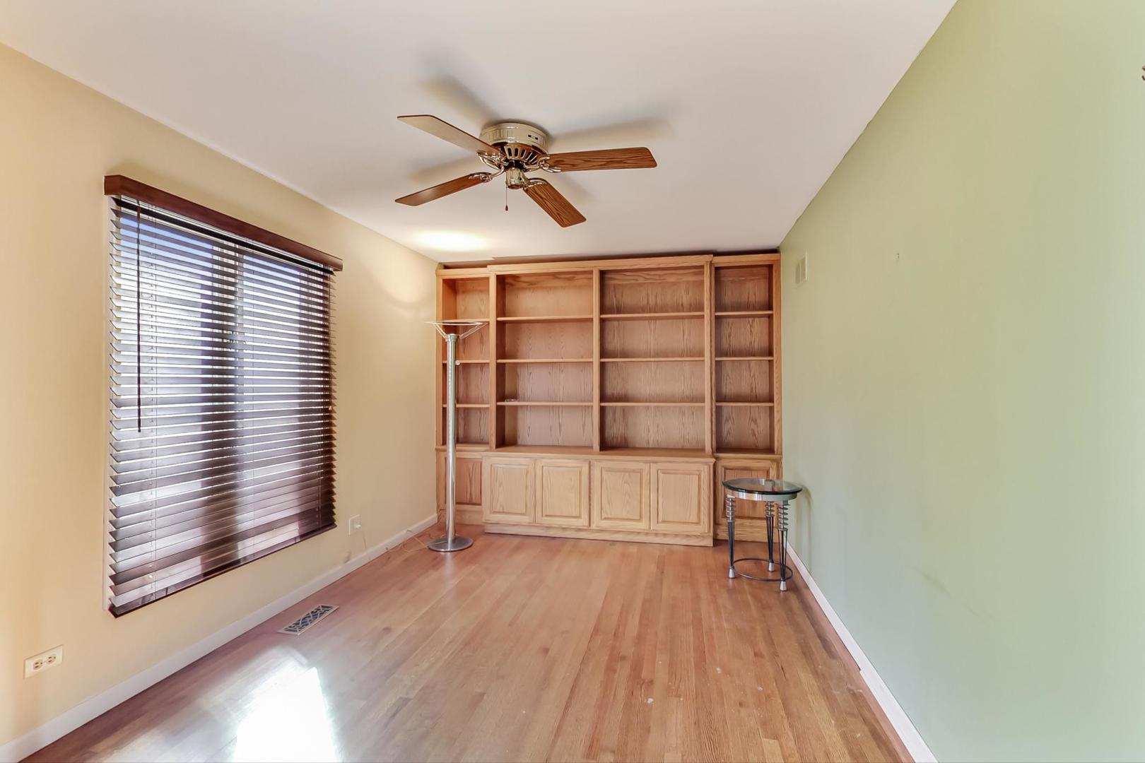 2813 Meyers Road Oak Brook, IL 60523 - Photo 19 of 62 a view of empty room with wooden floor and fan