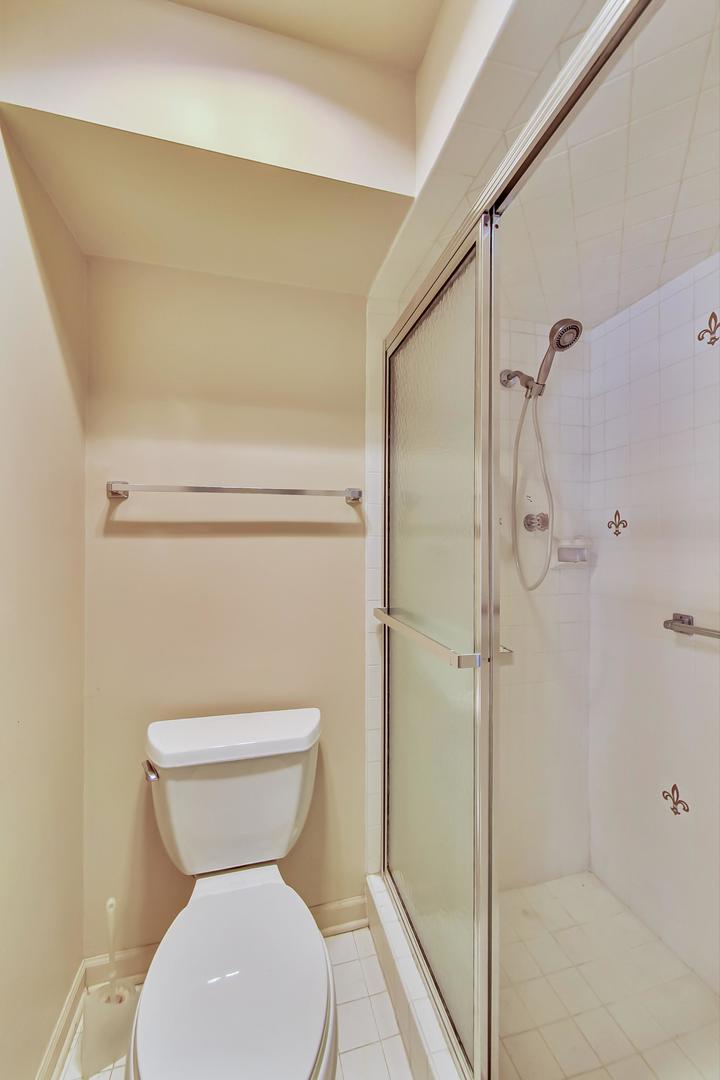 2813 Meyers Road Oak Brook, IL 60523 - Photo 26 of 62 a bathroom with a toilet and a shower