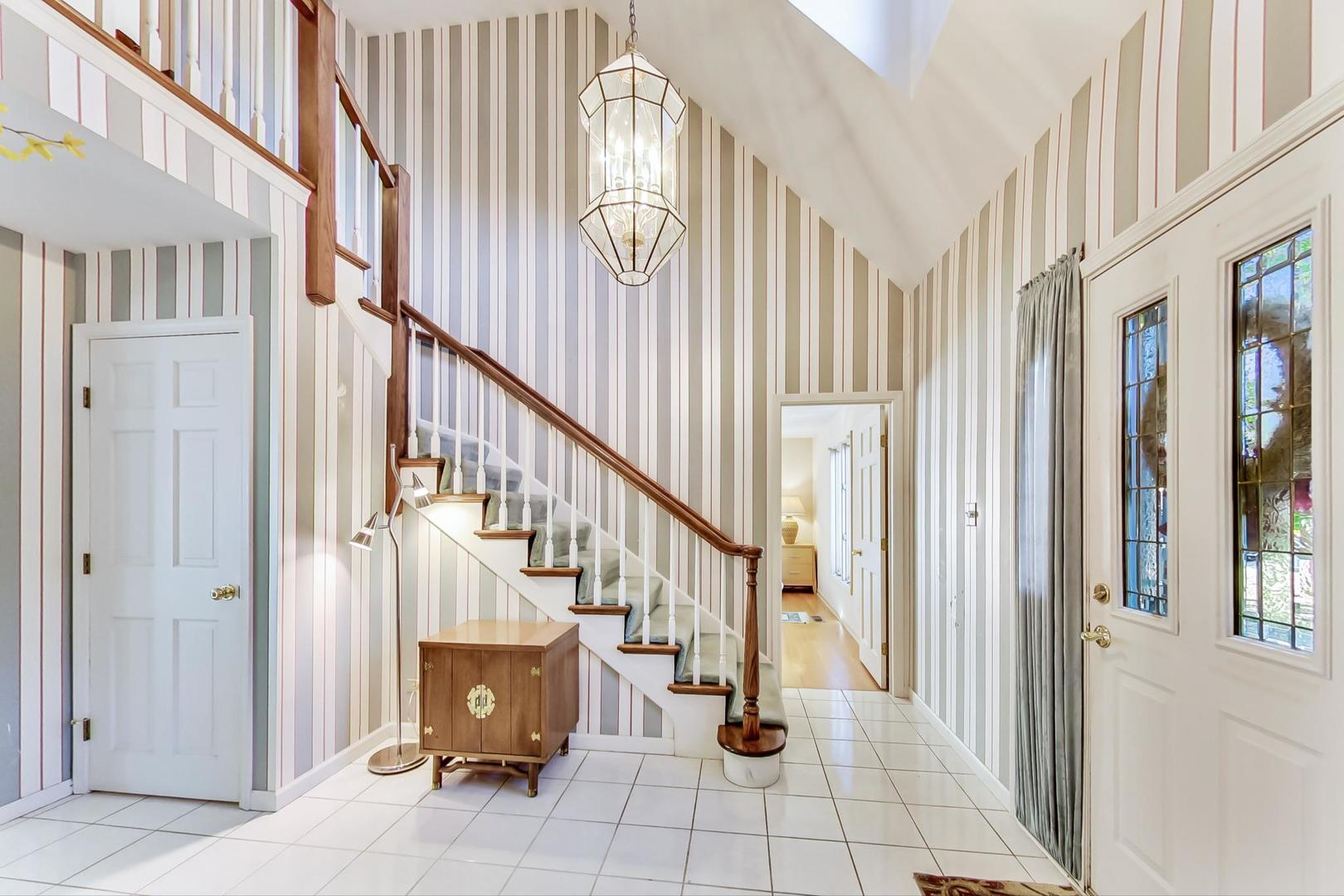 2813 Meyers Road Oak Brook, IL 60523 - Photo 4 of 62 a view of an entryway with staircase