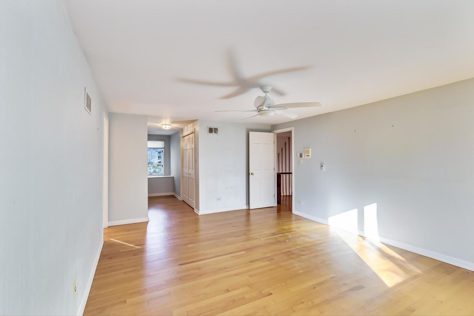 2813 Meyers Road Oak Brook, IL 60523 - Photo 34 of 62 a view of an empty room with wooden floor