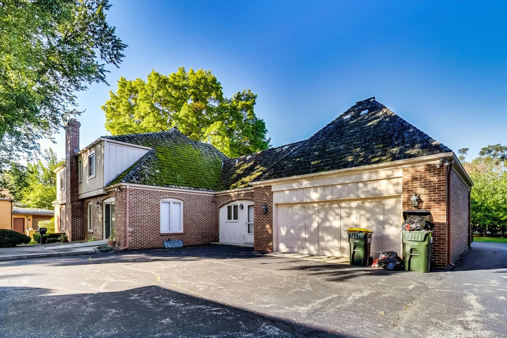 2813 Meyers Road Oak Brook, IL 60523 - Photo 56 of 62 a view of a house with a tree in front