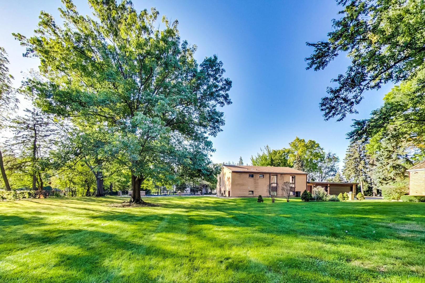 2813 Meyers Road Oak Brook, IL 60523 - Photo 61 of 62 a view of a house with a yard
