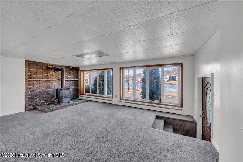 1228 Lake Road Factoryville, PA 18419 - Photo 4 of 43 an empty room with windows