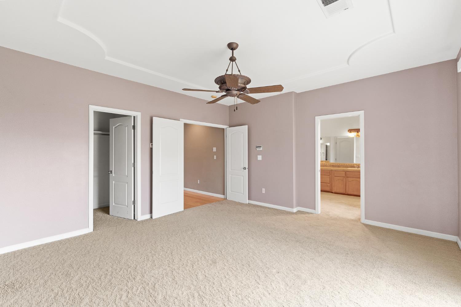 783 Bodega Avenue Lemoore, CA 93245 - Photo 19 of 35 a view of a livingroom with a chandelier