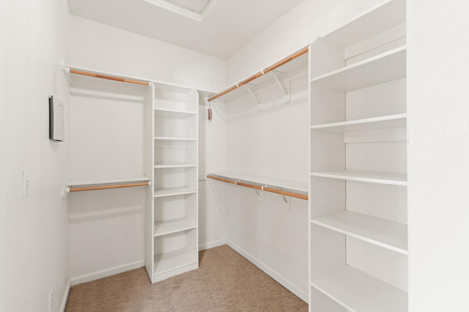 783 Bodega Avenue Lemoore, CA 93245 - Photo 21 of 35 a view of an empty walk in closet