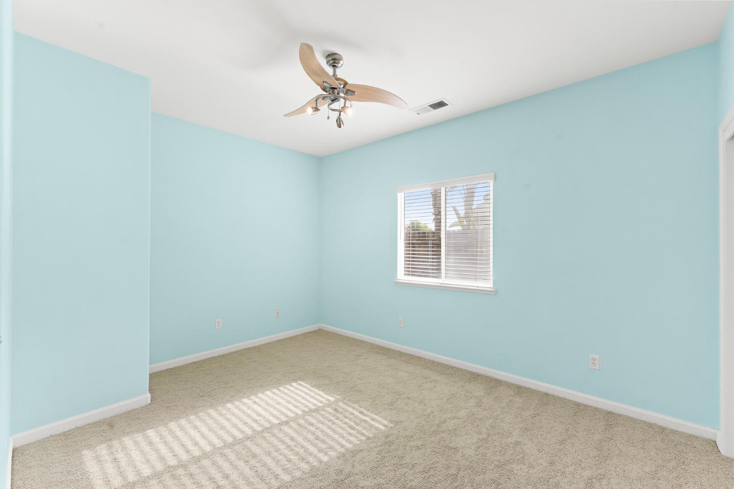 783 Bodega Avenue Lemoore, CA 93245 - Photo 28 of 35 an empty room with a window