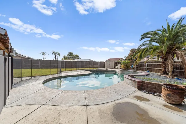 a view of a house with swimming pool