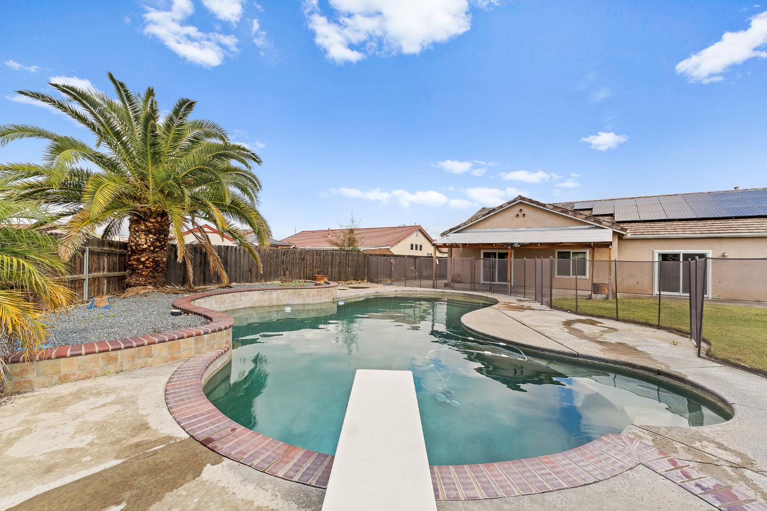 783 Bodega Avenue Lemoore, CA 93245 - Photo 35 of 35 a view of a house with swimming pool