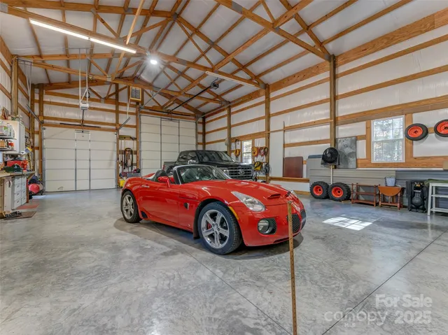 a view of a forest with mountains in the background