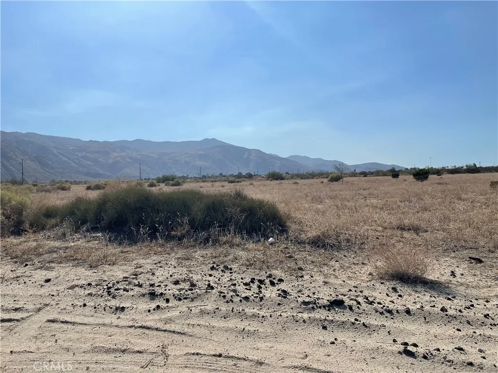 0 Olive Cabazon, CA 92230 - Photo 11 of 13 a view of a lake with mountains in the background