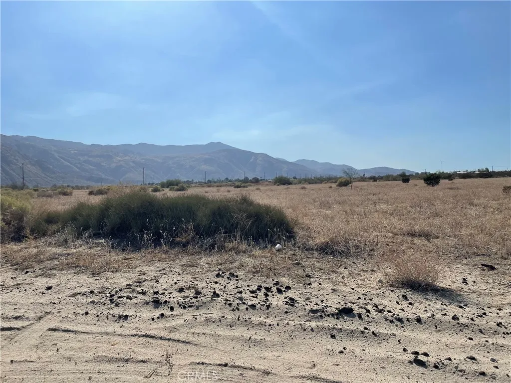 0 Olive Cabazon, CA 92230 - Photo 5 of 13 a view of a lake with mountains in the background