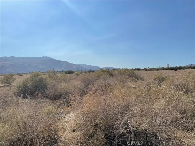 a view of ocean view with lots of trees in the background