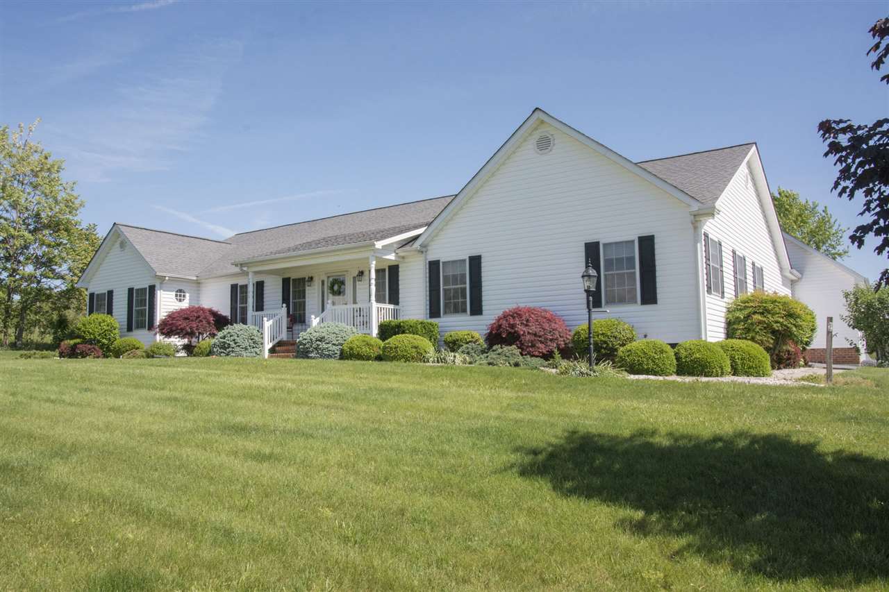 95 Lea Port Road Mount Sidney, VA 24467 - Photo 1 of 37 a front view of a house with a yard and garage