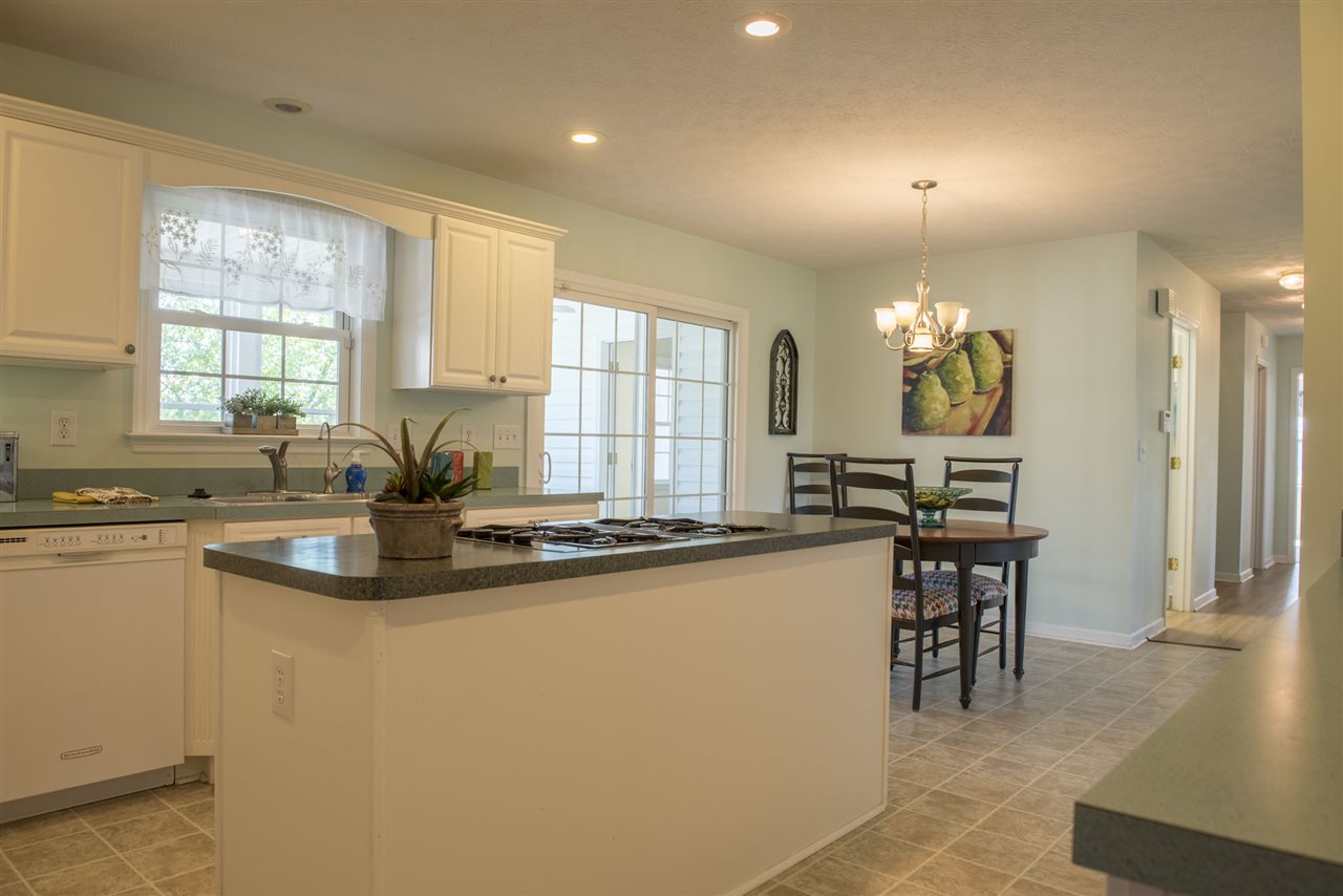 95 Lea Port Road Mount Sidney, VA 24467 - Photo 12 of 37 a kitchen with counter top space appliances and windows