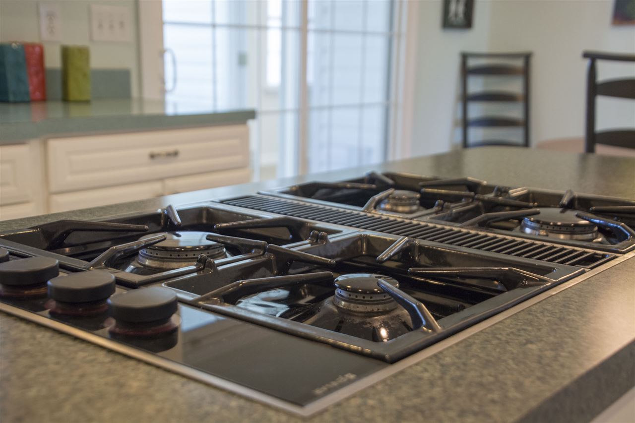 95 Lea Port Road Mount Sidney, VA 24467 - Photo 13 of 37 a close up of a blue stove sitting inside of a kitchen