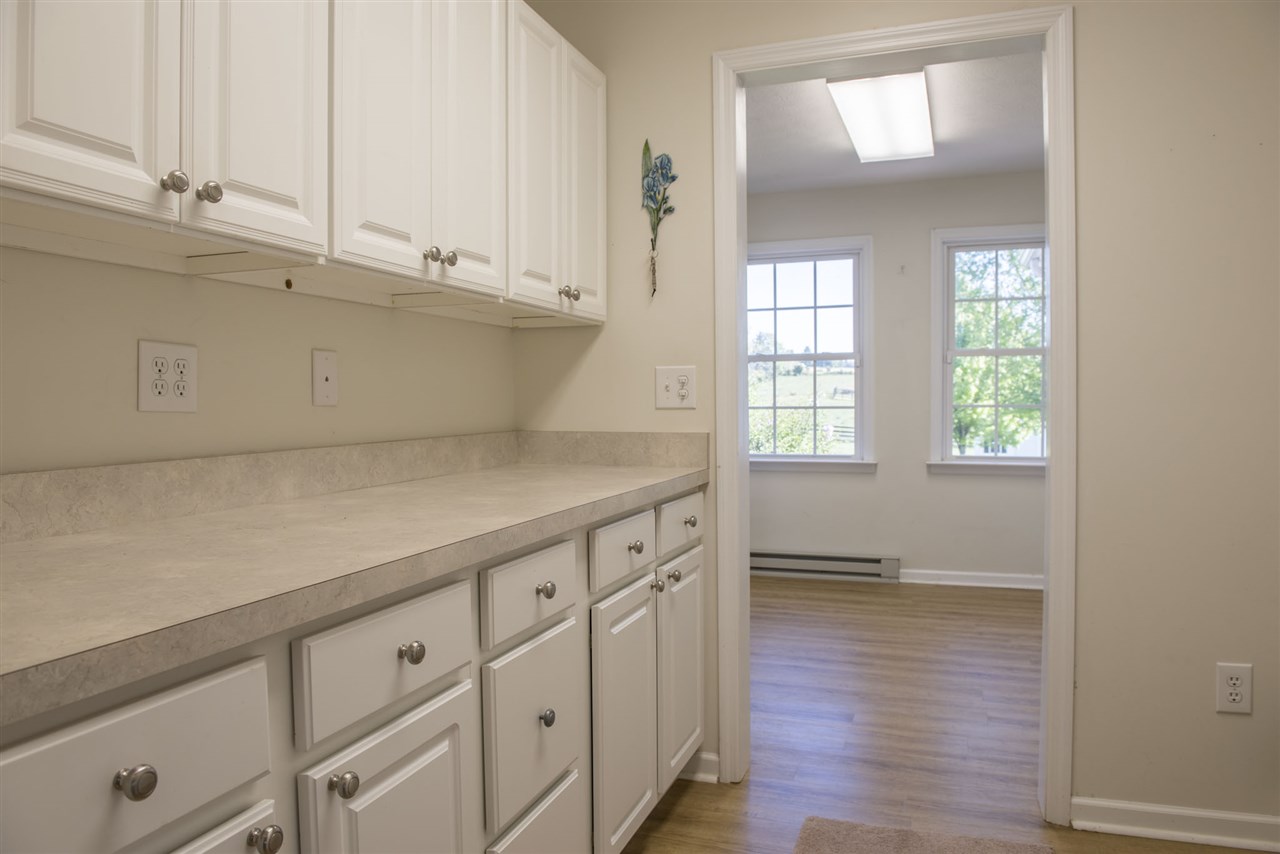 95 Lea Port Road Mount Sidney, VA 24467 - Photo 14 of 37 a view of cabinets and wooden floor