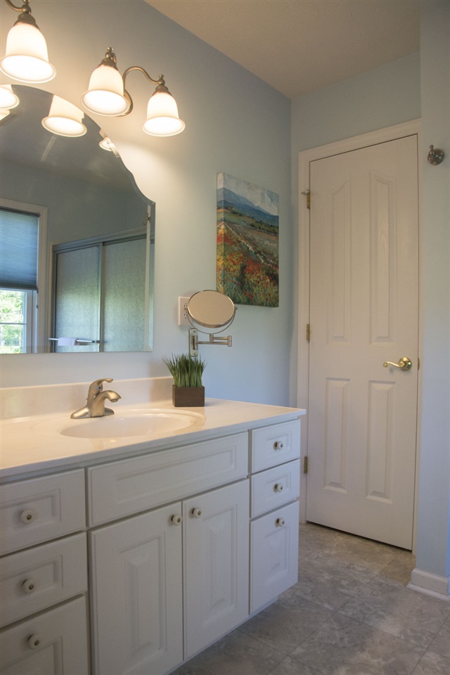 95 Lea Port Road Mount Sidney, VA 24467 - Photo 21 of 37 a bathroom with a double vanity sink and a mirror