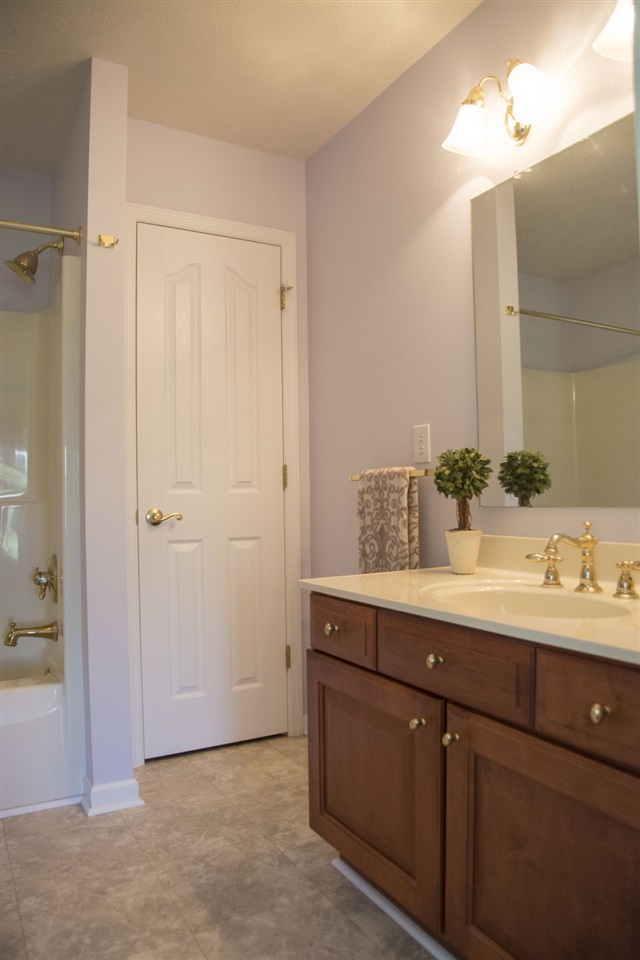 95 Lea Port Road Mount Sidney, VA 24467 - Photo 23 of 37 a bathroom with a double vanity sink and mirror